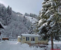 Camping-Appartements-Bungalows Erlengrund Im Sommer und im Winter sind Mobilheime zu mieten
